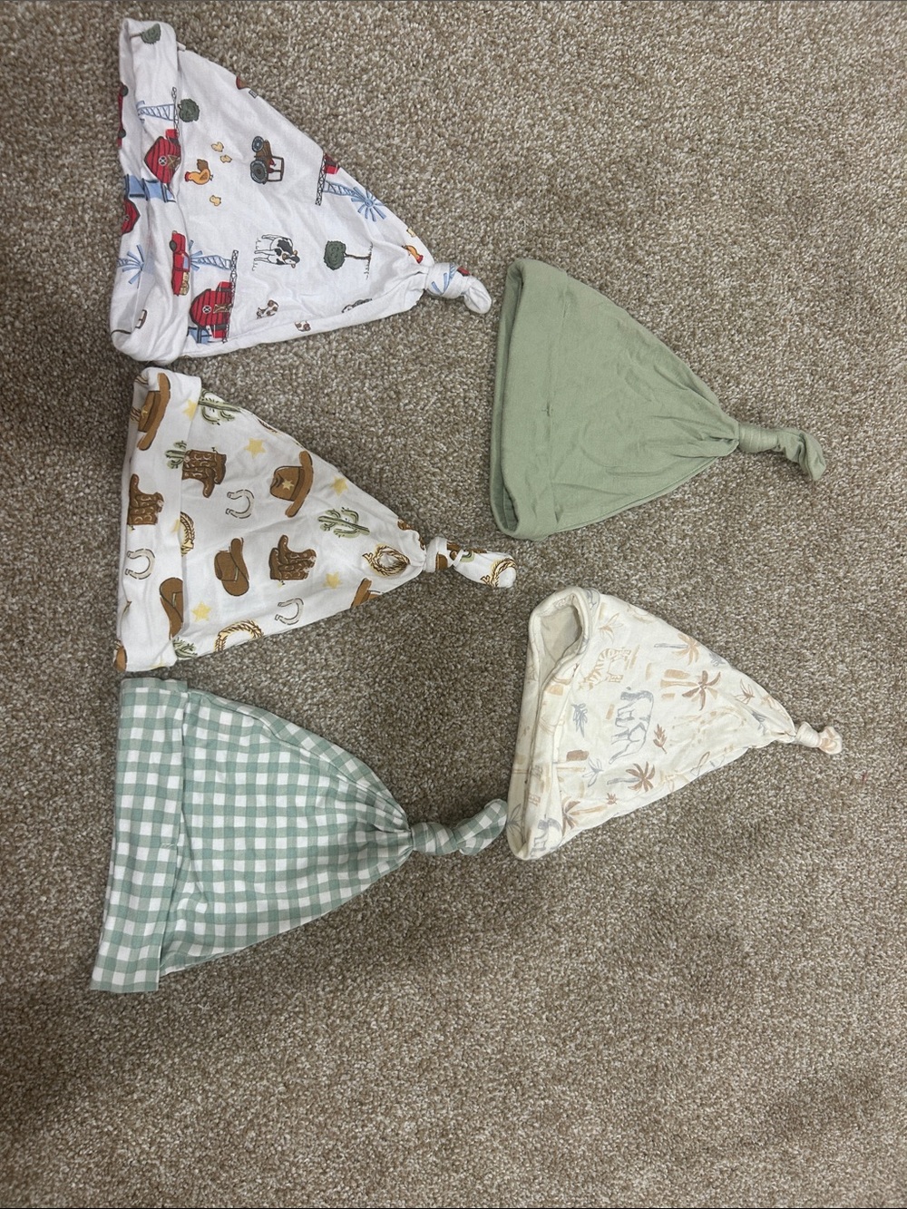 Bundle of baby beanie top knot hats